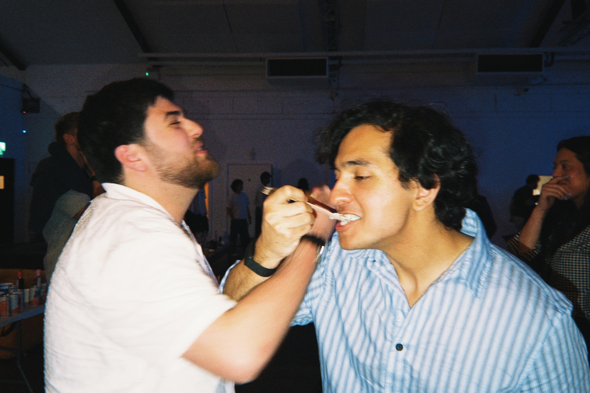 Friends sharing food at a social gathering